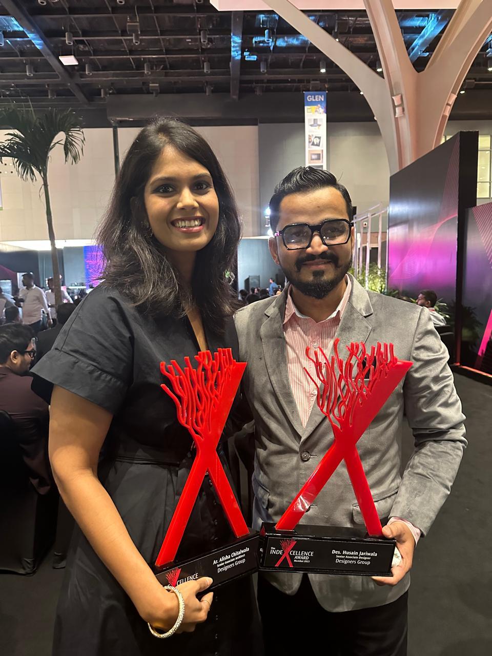 Red trophies at an awards ceremony